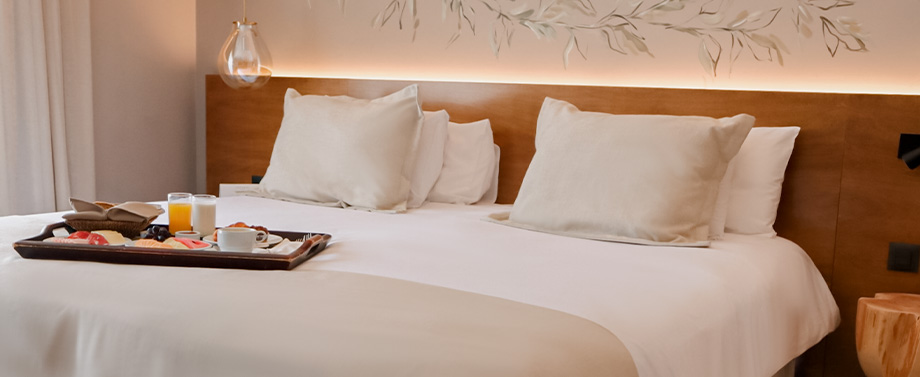 Habitación Superior de Hotel Cottage Carrasco con desayuno en la cama